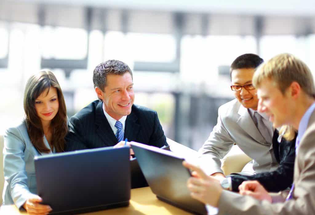 Business meeting - manager discussing work with his colleagues