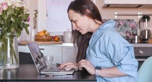 A Girl With A Notebook And Computer